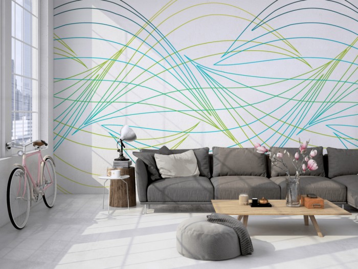 Die Design-Fototapete Geometrie Wellen in Grün auf einer großen Wand im Loft tapeziert. Die Design-Fototapete Geometrie Wellen in Grün wird individuell auf Deine Wand angepasst.