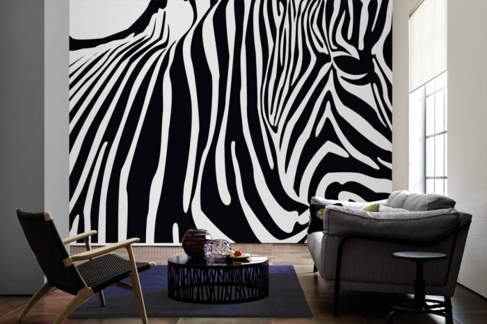 Im Wohnzimmer die Fototapete Zebra, Artwork auf einer großen Wand tapeziert. Die Fototapete Zebra, Artwork ist als Vlies-Fototapete im Wohnzimmer leicht zu tapezieren.