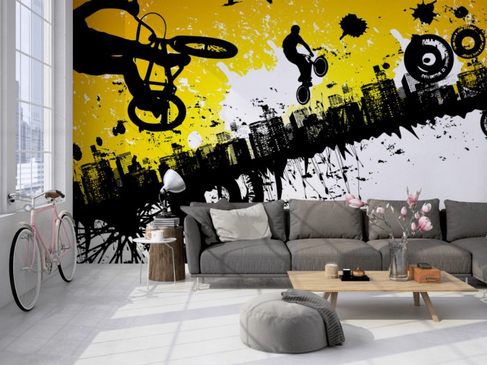 Die Design-Fototapete BMX Fahrer in der Stadt, Artwork für Kinder auf einer großen Wand im Loft tapeziert. Die Design-Fototapete BMX Fahrer in der Stadt, Artwork für Kinder wird individuell auf Deine Wand angepasst.