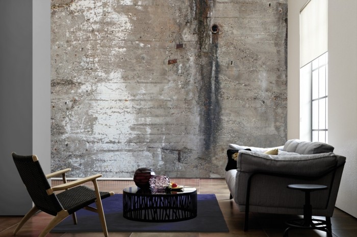 Im Wohnzimmer die Fototapete Beton Wand, Vintage Wand auf einer großen Wand tapeziert. Die Fototapete Beton Wand, Vintage Wand ist als Vlies-Fototapete im Wohnzimmer leicht zu tapezieren.