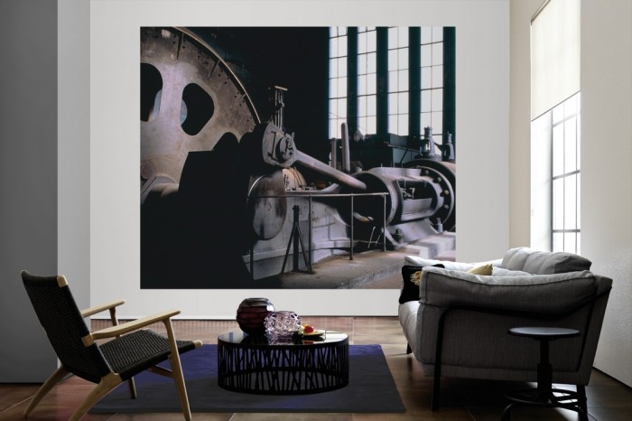 Die Fototapete Alte Dampfmaschine als große Bildtapete im Wohnzimmer. Als Bildtapete ist die Fototapete Alte Dampfmaschine ein besonderes Highlight auf Vliestapete.