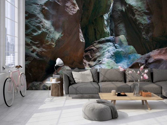 Die Fototapete Felswand in einer Höhle auf einer großen Wand im Loft tapeziert. Die Fototapete Felswand in einer Höhle wird individuell auf Deine Wand angepasst.