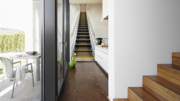 Ein Foto von dem 3D Fotopanel Rolltreppe tapeziert in der Küche. Bestelle Deine Bildtapete online.