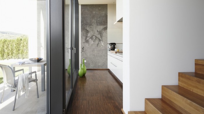 Ein Foto von dem Design-Fotopanel New York, Stern auf Steinwand von Michalsky tapeziert in der Küche. Bestelle Deine Bildtapete online.