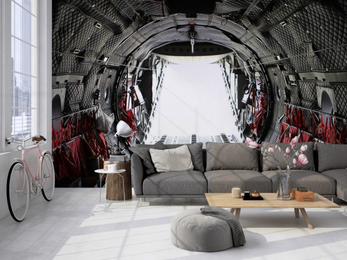 Die Fototapete Jet Ausstieg vom Laderaum auf einer großen Wand im Loft tapeziert. Die Fototapete Jet Ausstieg vom Laderaum wird individuell auf Deine Wand angepasst.