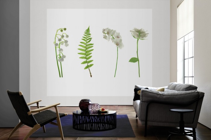 Die Fototapete Blumen in Weiß und Grün als große Bildtapete im Wohnzimmer. Als Bildtapete ist die Fototapete Blumen in Weiß und Grün ein besonderes Highlight auf Vliestapete.