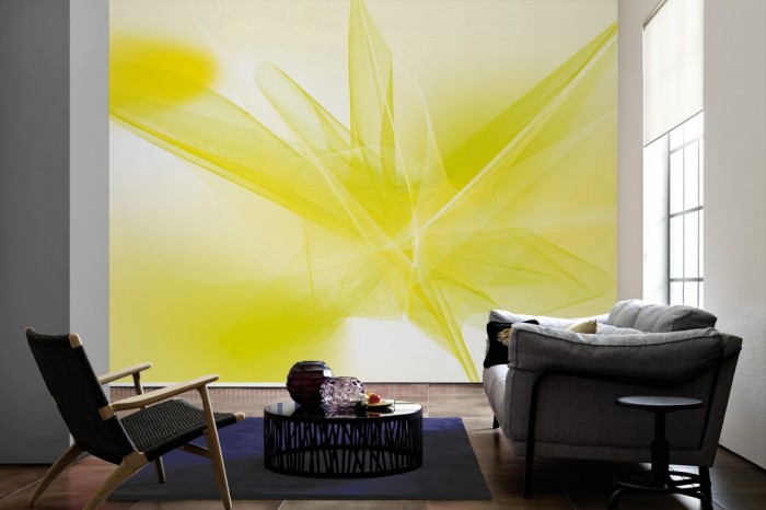 Im Wohnzimmer die Design-Fototapete 3D-Geometrie plastische Formen Grün auf einer großen Wand tapeziert. Die Design-Fototapete 3D-Geometrie plastische Formen Grün ist als Vlies-Fototapete im Wohnzimmer leicht zu tapezieren.