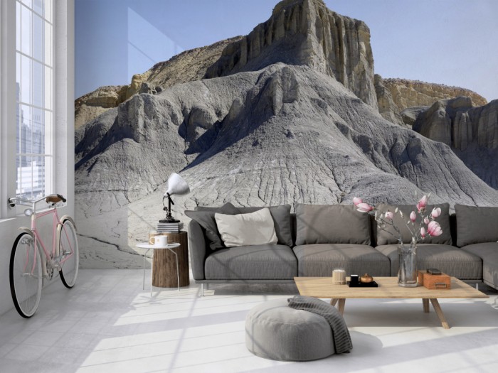 Die Fototapete Berg Badlands-Nationalpark in South Dakota, USA auf einer großen Wand im Loft tapeziert. Die Fototapete Berg Badlands-Nationalpark in South Dakota, USA wird individuell auf Deine Wand angepasst.