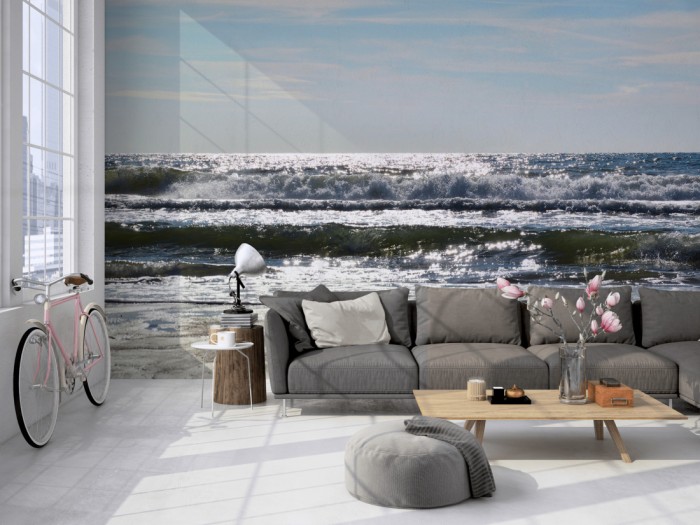 Die Fototapete Wellen der Nordsee auf einer großen Wand im Loft tapeziert. Die Fototapete Wellen der Nordsee wird individuell auf Deine Wand angepasst.