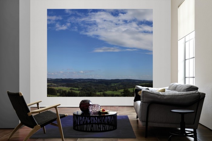 Die Fototapete Panorama Berglisches Land am Sommertag als große Bildtapete im Wohnzimmer. Als Bildtapete ist die Fototapete Panorama Berglisches Land am Sommertag ein besonderes Highlight auf Vliestapete.