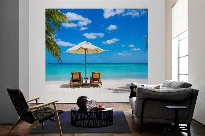 Die Fototapete Strandurlaub unter Palmen in Mexico als große Bildtapete im Wohnzimmer. Als Bildtapete ist die Fototapete Strandurlaub unter Palmen in Mexico ein besonderes Highlight auf Vliestapete.