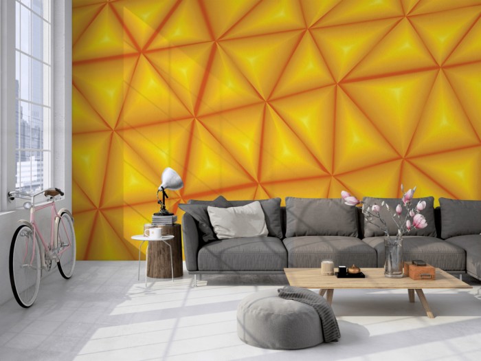 Die Design-Fototapete 3D-Geometrie orangene Dreiecke auf einer großen Wand im Loft tapeziert. Die Design-Fototapete 3D-Geometrie orangene Dreiecke wird individuell auf Deine Wand angepasst.