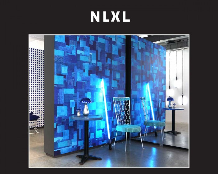 Die NLXL Tapete PNO-03 Addiction von Paola Navone tapeziert an einer Wand.