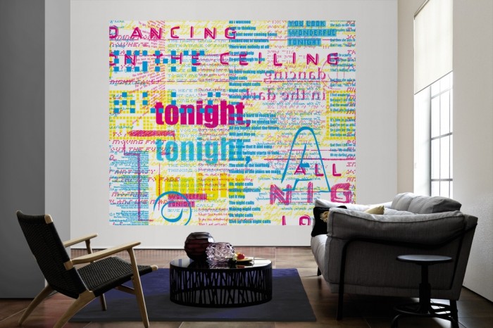 Die Designer-Fototapete Chamäleon-Effekt Schriften als große Bildtapete im Wohnzimmer. Als Bildtapete ist die Designer-Fototapete Chamäleon-Effekt Schriften ein besonderes Highlight auf Vliestapete.