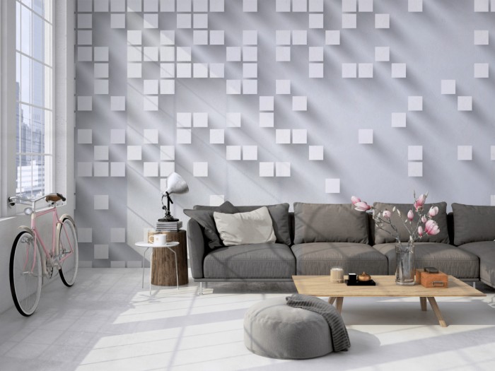 Die Design-Fototapete 3D-Geometrie graue Würfel auf einer großen Wand im Loft tapeziert. Die Design-Fototapete 3D-Geometrie graue Würfel wird individuell auf Deine Wand angepasst.