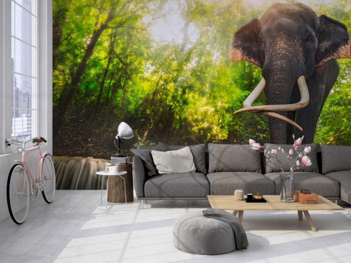 Die Fototapete Elefant im Urwald auf einer großen Wand im Loft tapeziert. Die Fototapete Elefant im Urwald wird individuell auf Deine Wand angepasst.