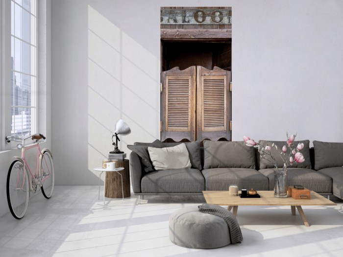 Das 3D Fotopanel Eingang zum Saloon tapeziert in einem Loft. Bestelle die Bildtapete für Deine Wand online.