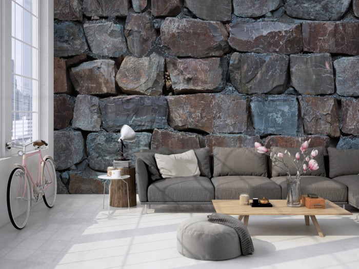 Die Fototapete Stein Wand, große Blocksteine auf einer großen Wand im Loft tapeziert. Die Fototapete Stein Wand, große Blocksteine wird individuell auf Deine Wand angepasst.