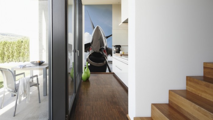 Ein Foto von dem 3D-Fotopanel Propeller eines Flugzeuges tapeziert in der Küche. Bestelle Deine Bildtapete online.