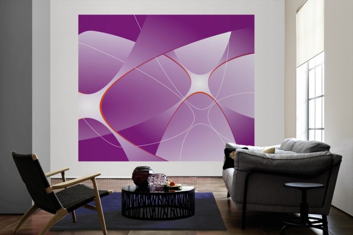 Die Design-Fototapete 3D-Geometrie plastische Formen Violett als große Bildtapete im Wohnzimmer. Als Bildtapete ist die Design-Fototapete 3D-Geometrie plastische Formen Violett ein besonderes Highlight auf Vliestapete.