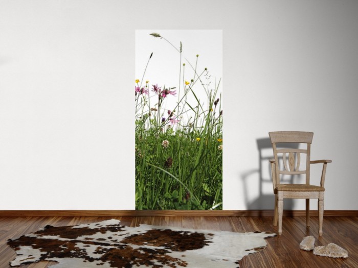 Ein Foto von dem 3D Fotopanel Grüne Blumenwiese tapeziert an der Wand. Bestelle Deine Bildtapete online.