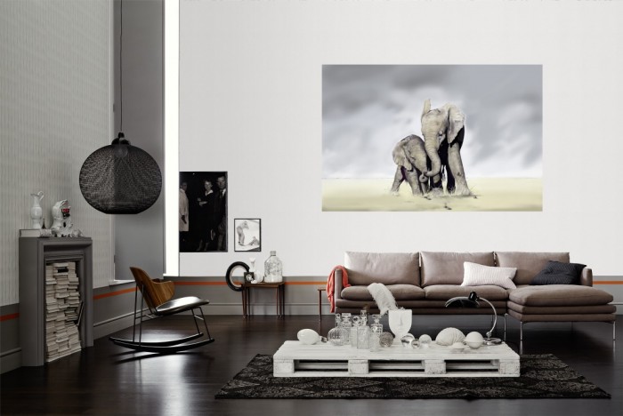 Die Fototapete Elefanten Familie als Wandbild im Wohnzimmer. Die Vlies-Fototapete Elefanten Familie verschönert als Wandbild Deine Wand.