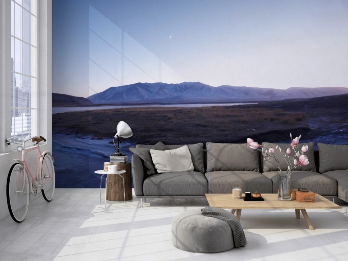 Die Fototapete Island Landschaft bei Sonnenaufgang auf einer großen Wand im Loft tapeziert. Die Fototapete Island Landschaft bei Sonnenaufgang wird individuell auf Deine Wand angepasst.