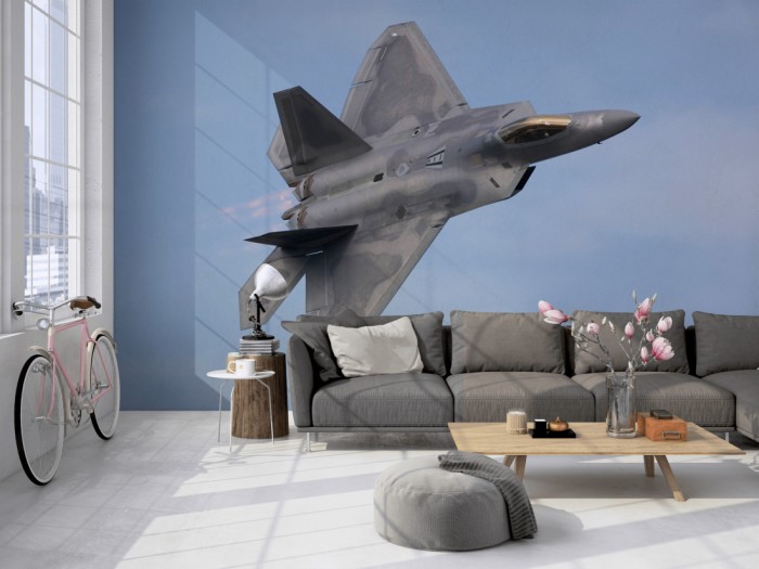 Die Fototapete Jet, Lockheed Martin F-22 Raptor auf einer großen Wand im Loft tapeziert. Die Fototapete Jet, Lockheed Martin F-22 Raptor wird individuell auf Deine Wand angepasst.