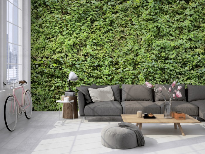 Die Fototapete Gartenhecke mit Blättern auf einer großen Wand im Loft tapeziert. Die Fototapete Gartenhecke mit Blättern wird individuell auf Deine Wand angepasst.