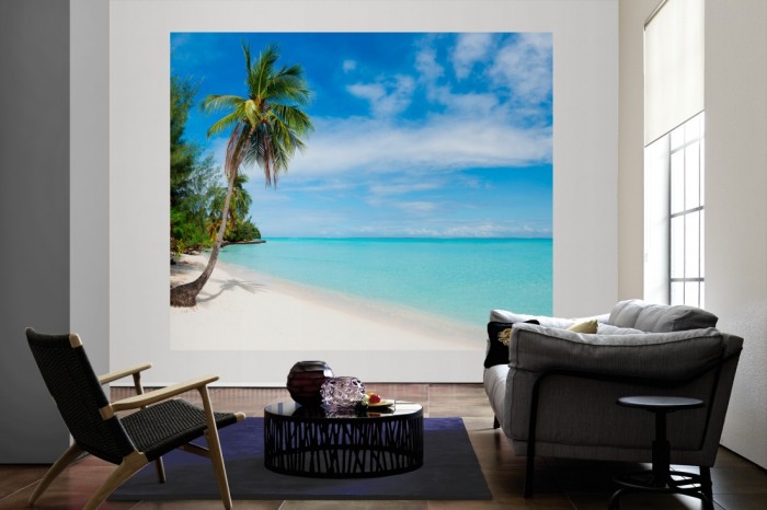 Die Fototapete Strand in der Karibik als große Bildtapete im Wohnzimmer. Als Bildtapete ist die Fototapete Strand in der Karibik ein besonderes Highlight auf Vliestapete.