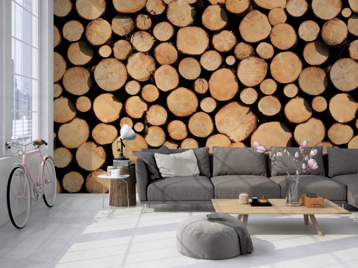 Die Fototapete Holz Wand, Baumstämme auf einer großen Wand im Loft tapeziert. Die Fototapete Holz Wand, Baumstämme wird individuell auf Deine Wand angepasst.