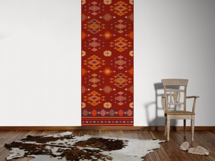 Ein Foto von dem Design-Fotopanel Teppich im Ethno-Look tapeziert an der Wand. Bestelle Deine Bildtapete online.