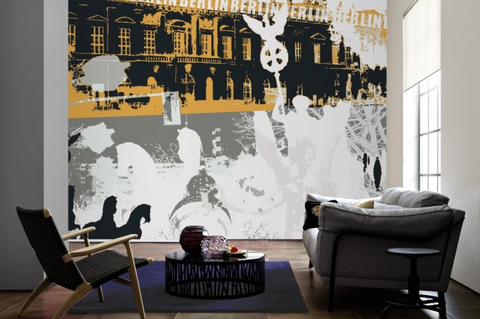 Im Wohnzimmer die Design-Fototapete Berlin Deutschland, Artwork auf einer großen Wand tapeziert. Die Design-Fototapete Berlin Deutschland, Artwork ist als Vlies-Fototapete im Wohnzimmer leicht zu tapezieren.