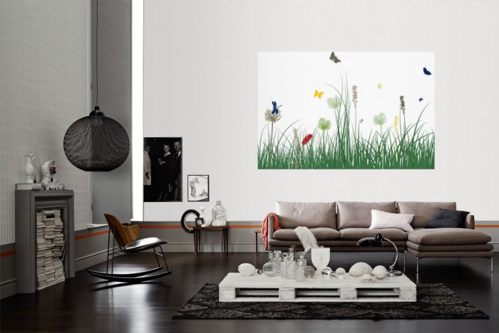 Die Design-Fototapete Blumenwiese Frühling, Artwork als Wandbild im Wohnzimmer. Die Vlies-Design-Fototapete Blumenwiese Frühling, Artwork verschönert als Wandbild Deine Wand.