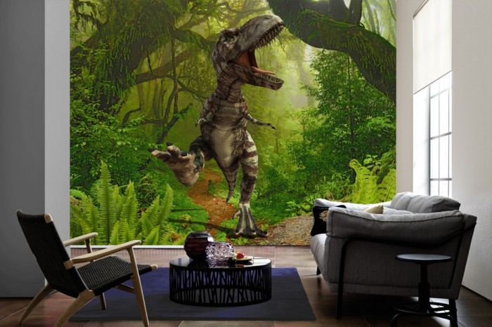 Im Wohnzimmer die Fototapete Dinosaurier im Dschungel, T-Rex auf einer großen Wand tapeziert. Die Fototapete Dinosaurier im Dschungel, T-Rex ist als Vlies-Fototapete im Wohnzimmer leicht zu tapezieren.