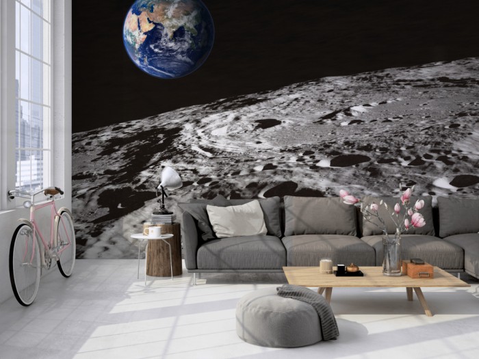 Die Fototapete Erde vom Mond auf einer großen Wand im Loft tapeziert. Die Fototapete Erde vom Mond wird individuell auf Deine Wand angepasst.