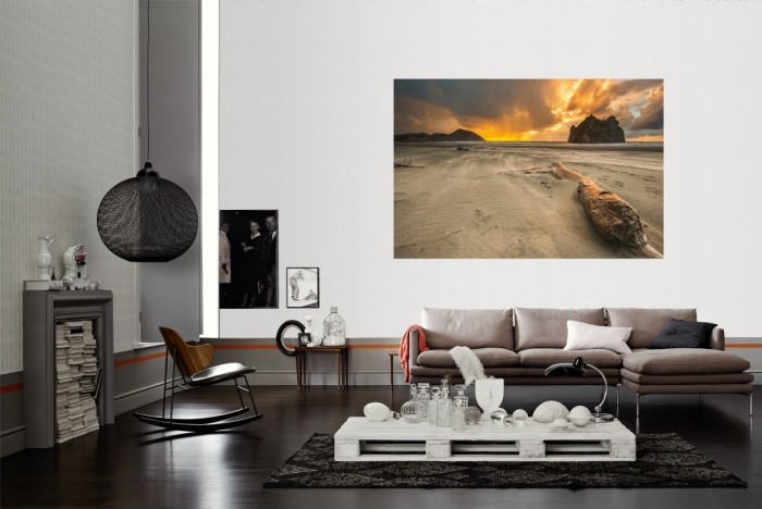 Die Fototapete Strand von Neuseeland bei Sonnenuntergang als Wandbild im Wohnzimmer. Die Vlies-Fototapete Strand von Neuseeland bei Sonnenuntergang verschönert als Wandbild Deine Wand.