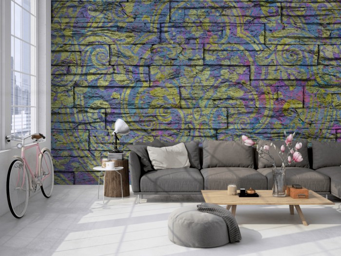 Die Designtapete Barock Ornament, Steinwand bunt auf einer großen Wand im Loft tapeziert. Die Designtapete Barock Ornament, Steinwand bunt wird individuell auf Deine Wand angepasst.